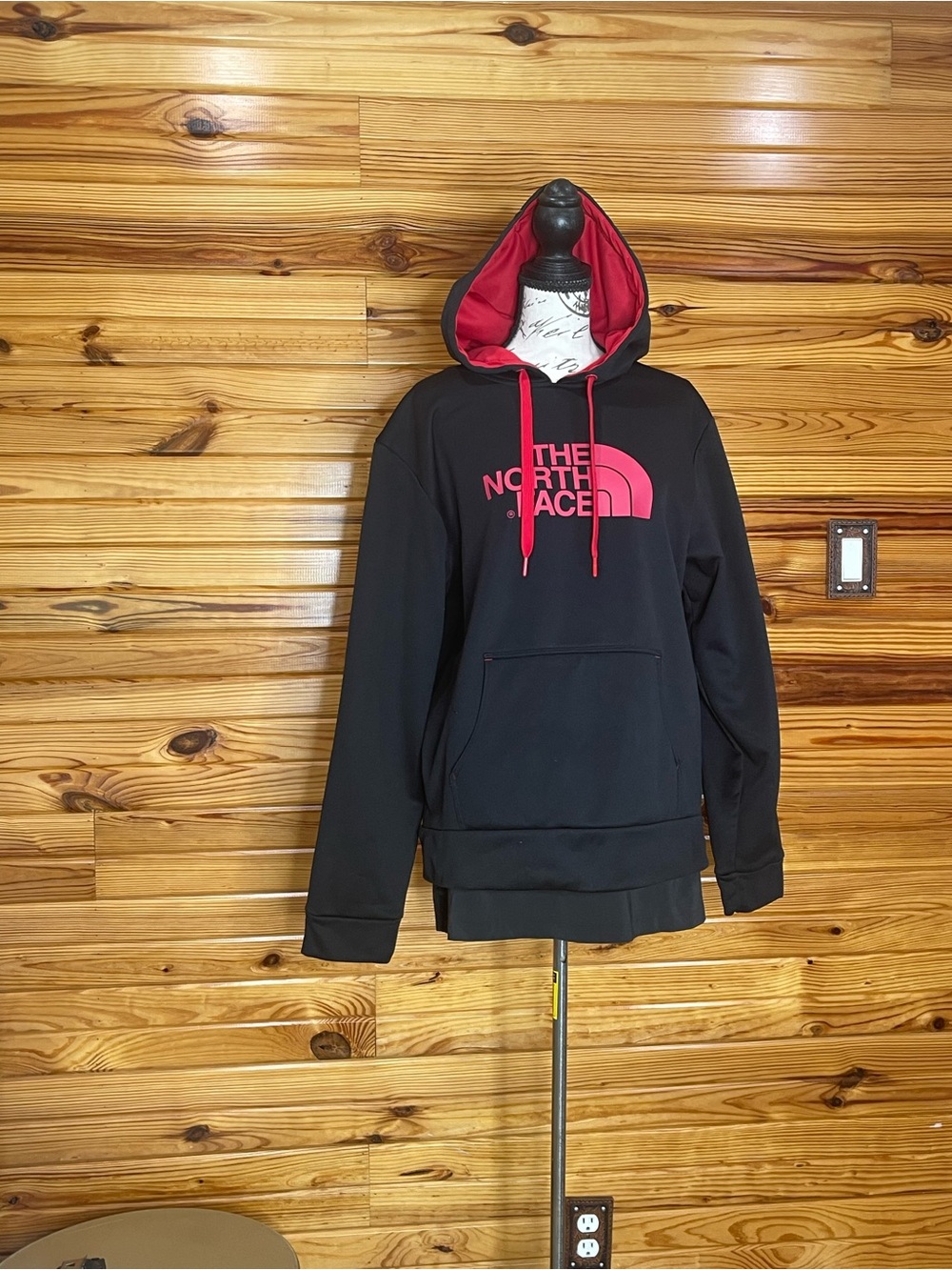 The North Face Black Hoodie with Red Logo and Lined Hood